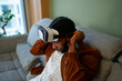 © Artcore Studio/Stocksy - Man puts on virtual reality headset