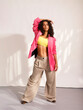 © valbar STUDIO/Stocksy - young brunette woman full body portrait
