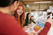 © VICTOR TORRES/Stocksy - Young professionals collaborating in a modern office