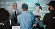 © SparkPix/peopleimages.com - Security, presentation and group in control room with people for strategy, planning for satellite surveillance. Government, briefing and team in cctv command center at intelligence agency or meeting