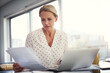 © Hinrichsen/peopleimages.com - Laptop, woman or worry with documents in home for invoice review, compare client data or remote work. Freelance accountant, mature person and tech with concern for receipts and cash flow verification