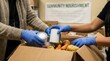 © Luminostock 54 - leadership development nonprofits volunteer concept. Hands sorting food donations in a community service setting.
