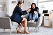 © Pixel-Shot - Female psychologist calming drug addict in office