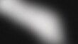 © TANVIR - A light beam shines brightly on a dark surface creating a dramatic visual effect in a photograph from a close-up viewpoint