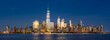 © Francois Roux - Panoramic view of New York City Lower Manhattan skyline at dusk with the Hudson River. Illuminated skyscrapers of the Financial District and World Trade Center