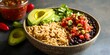 © Tasnim - Brown rice black bean bowl with avocado and salsa food