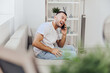 © SHOTPRIME STUDIO - A cheerful man engaging in an emotional phone call, reflecting on mental health and modern communication challenges, capturing relatable moments of vulnerability.