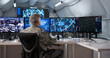 © Andrey Popov - Military Officer Monitoring Surveillance Data On Desktop Computer
