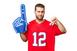 © luismolinero - sports fan man over isolated chroma key background showing thumb down with negative expression