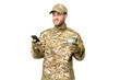 © luismolinero - Military man over isolated chroma key background holding coffee to take away and a mobile