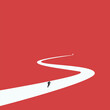 © anuchit - Businessman running on long winding road toward goal success concept