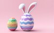 © YiuCheung - Two colorful Easter eggs, one shaped like a bunny, against soft pink background.