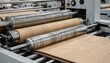 © DigitalSpace - Medium view of multiline creasing rollers pressing parallel fold marks into cardboard showcasing advanced machinery setup for complex folding designs.