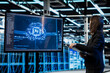 © DC Studio - Artificial intelligence AR visualization used by server hub programmer to do gear maintenance. Female engineer monitoring AI neural network data center rigs with display, holographic VFX compositing