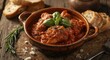 © pngking - Classic chicken cacciatore dish with tomato sauce served in rustic style