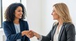 © Angavlan - Business Partners Handshake in Modern Office Setting for Corporate Websites, Professional Networking, Business Development Blogs, and Entrepreneurship Content