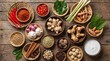 © Syeikh - Vibrant assortment of fresh Asian spices, aromatic herbs, and natural cooking ingredients beautifully arranged on rustic wooden background