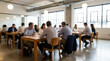 © Rahman - Blurred image of diverse business professionals collaborating in a modern, bright office meeting room with large windows