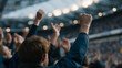 © forenna - A sports event where fans erupt in applause as their team scores a winning goal, highlighting the thrilling moment of triumph, united by the energy of the crowd celebrating together in a stadium.