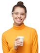 © Damir Khabirov - Woman holding coffee cup in yellow turtleneck with clear glasses