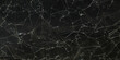 © Hendri - a black glass screen that is cracked and shattered into pieces on a dark background