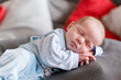 © Westend61 - Newborn baby boy sleeping on a blanket