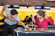 © auremar - portrait of young couple playing pool