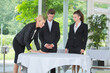© auremar - young waiter and waitress learning to set up table