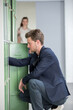 © auremar - Suited man at open locker
