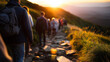 © Laura - Faceless group of people hiking up hill at sunset, defocused silhouettes in warm golden light with shadows, evening trekking scene, outdoor adventure photography, with copy space