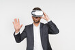 © InsideCreativeHouse - Virtual reality experience, modern technology, immersive entertainment, young man wearing a VR headset smiles against a white background, representing a joyful interaction with digital worlds