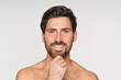 © InsideCreativeHouse - Hair, portrait and smile of man in studio for grooming, personal hygiene or wellness routine. Beauty, body and shampoo with happy shirtless model on white background space for haircare treatment