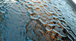 © Ricardo24 - Abstract Rippled Water Surface with Textured Reflection and Fluid Motion