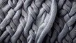 © Ina - grey knitted fabric cotton textured background closeup with copy space for your design