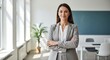 © visualdalamframe - Confident Professional Woman Smiling in Bright Modern Office Celebrating Empowerment for Women's Day, Corporate Professionalism and Collaboration Workspace with Greenery and Chalkboard Backdrop