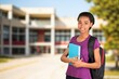 © BillionPhotos.com - Smiling female student enjoying school life