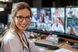 © Prazis Images - Smiling Female Doctor in a High-Tech Office for Telemedicine