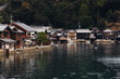 © tsuguliev - Ine Fishing Village, Kyoto prefecture, Japan, Ine-ura landscape coastal view, Funaya, traditional wooden boat houses, Ine Bay during boat tour cruise, Yoza District, in a autumn fall day