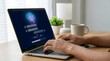 © solom - man typing on laptop using artificial intelligence chatbot with digital brain and voice wave interface on screen for machine learning and smart virtual assistant technology concept