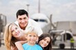 © BillionPhotos.com - Happy family passenger with kids in terminal