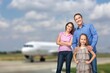 © BillionPhotos.com - Happy family passenger with kids in terminal