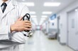 © BillionPhotos.com - Doctor with arms crossed with stethoscope in clinic