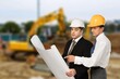 © BillionPhotos.com - Industrial engineers workers in hard hats talk of new project.