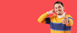© Pixel-Shot - Cool young man showing 'call me' gesture and pointing at viewer on red background