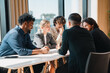 © chokniti - Creative business team meeting with professionals discussing project strategy, presenting ideas on board, teamwork collaboration concept in modern office environment