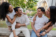 © PintoArt - Diverse group of young friends embracing laughing together