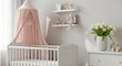 © Elena - Modern nursery with white crib and pink canopy featuring decor