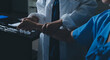 © Ketnapa - Doctor examining patient's elbow in hospital room