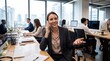 © YOUSSEF - Professional businesswoman talking on phone in modern office workplace. Corporate employee smiling during phone call. Team collaboration communication concept. Business woman at desk