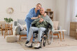 © Pixel-Shot - Nurse hugging mature woman after chemotherapy in wheelchair with warm plaid at home. Brain cancer concept